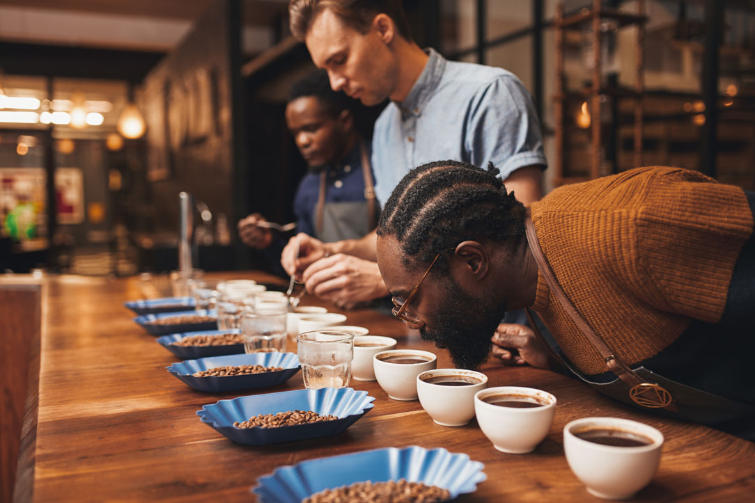 Man smelling coffee